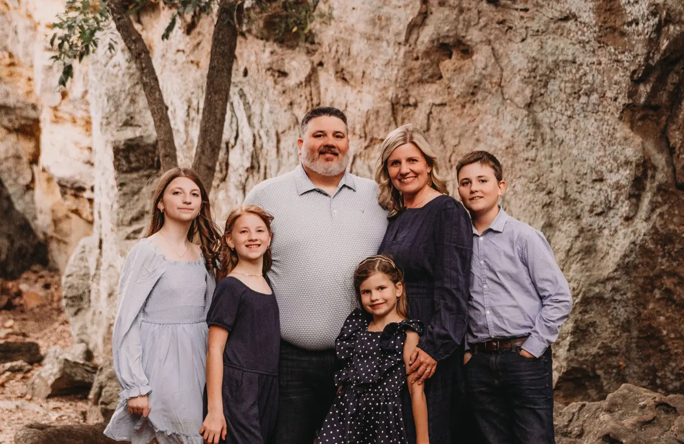 Dr. Aaron Lewis with his wife Julie and their four children